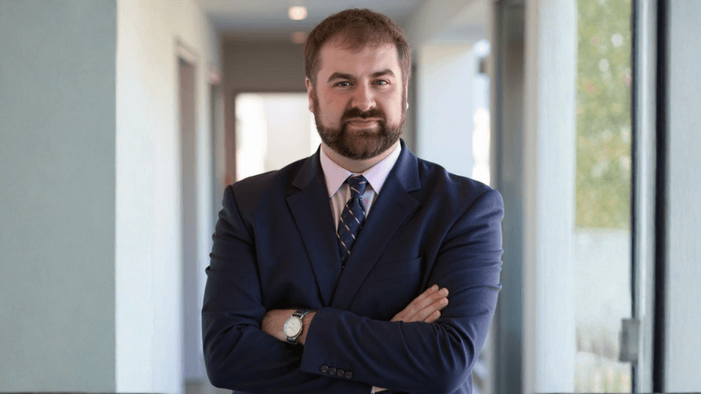 "Portrait of Cody Ross, founder of Prometheus Premier Marketing, showcasing his leadership in AI-driven marketing strategies for businesses.".cody