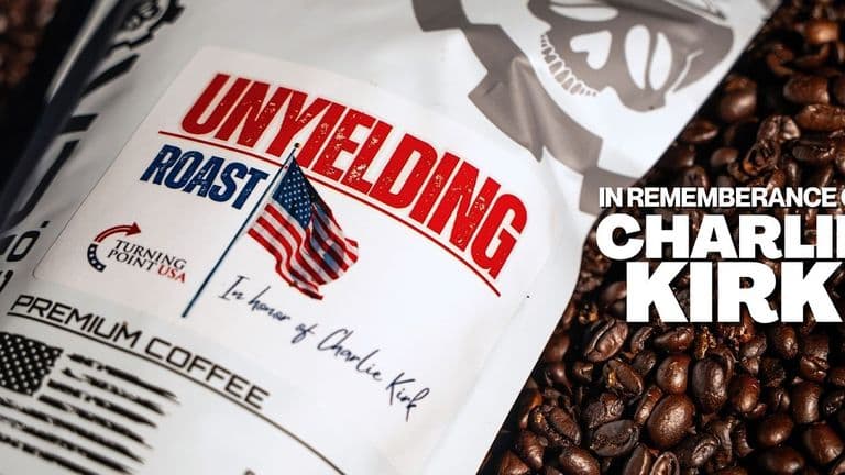 The image features a close-up of Blackout Coffee's "Unyielding Roast" packaging, honoring Charlie Kirk and supporting campus free speech.