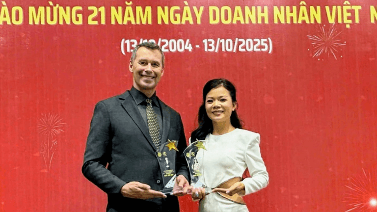"Dieter Bruhn and Tan Le receiving Outstanding Entrepreneur Awards, recognizing their contributions to leadership development and community impact in Southeast Asia."