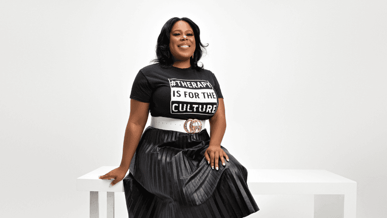 Dr. Adrienne White, founder of Dr. White Therapy Group, confidently promoting therapy for high-achievers and burnout recovery.
