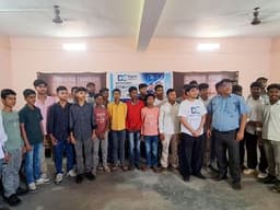 Manit Awtani stands with students and instructors participating in the Digital Coders program in Bihar.