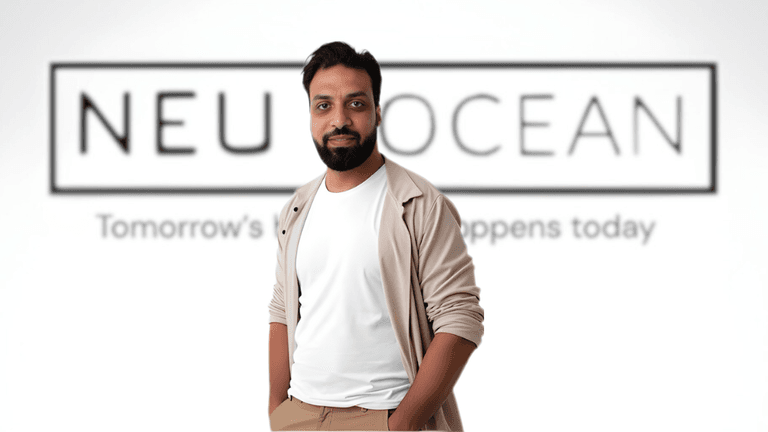 Amir Negm, founder of Neu Ocean Technologies, stands in front of the company logo, representing innovation in digital transformation.