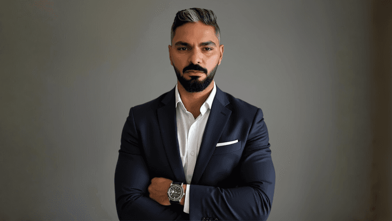 Saied Balajio, founder of Kenowt AI, in a professional suit, symbolizing leadership in transforming business automation globally.