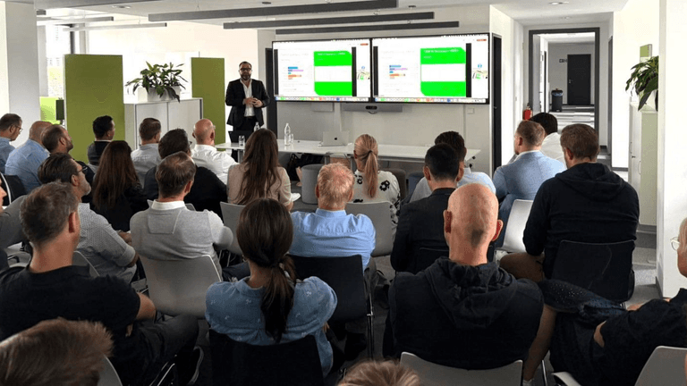 Riccardo Sbarboro presenting strategies for scalable customer success to an engaged audience.