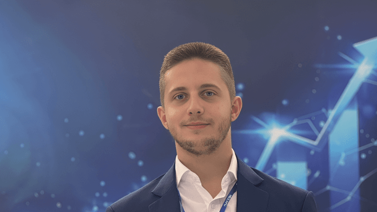 Leonidas Diamantopoulos, CEO of TechIns, stands against a digital backdrop, representing innovation and growth in Southeast Europe.