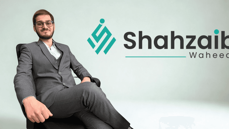 Shahzaib Waheed in a suit beside his logo, representing innovation in education, technology, and global entrepreneurship.