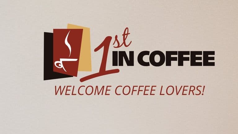 1st in Coffee logo with steaming coffee cup icon and “Welcome Coffee Lovers!” tagline on a brown background.