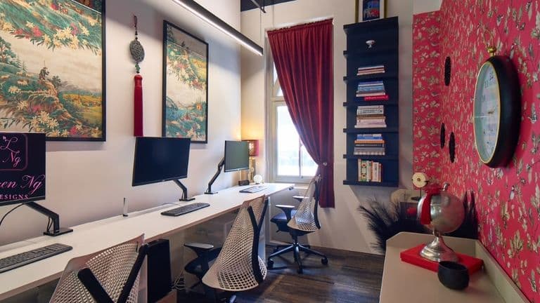 a stylish, modern workspace designed by Loren Ng Designs, featuring minimalist furniture, art, and thoughtful decor.