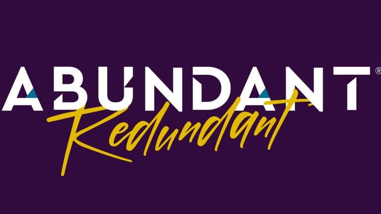 Abundant Redundant logo in white and gold on dark purple background.