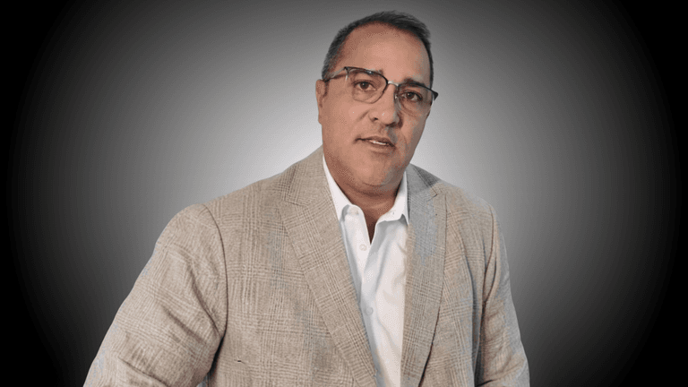 Juan Carlos Hicher, founder of JJ1 Investment Group and HM Development, leading U.S. real estate with a community-focused vision.