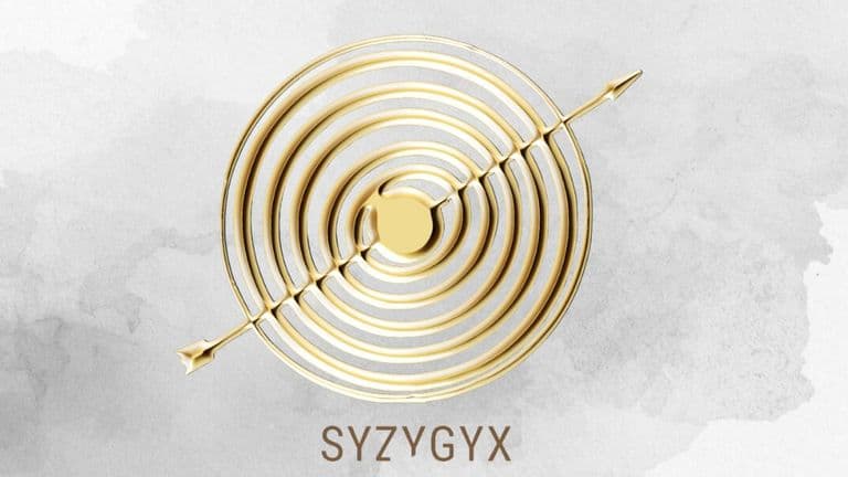Gold arrow representing syngvx, symbolizing innovation and Daniel McShan’s transformative approach to technology development.