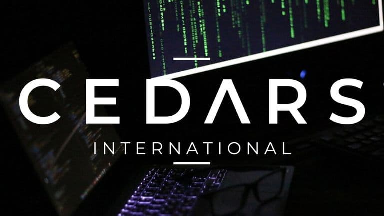 Cedars International logo over dark cybersecurity-themed screens displaying green code and laptop keyboards.