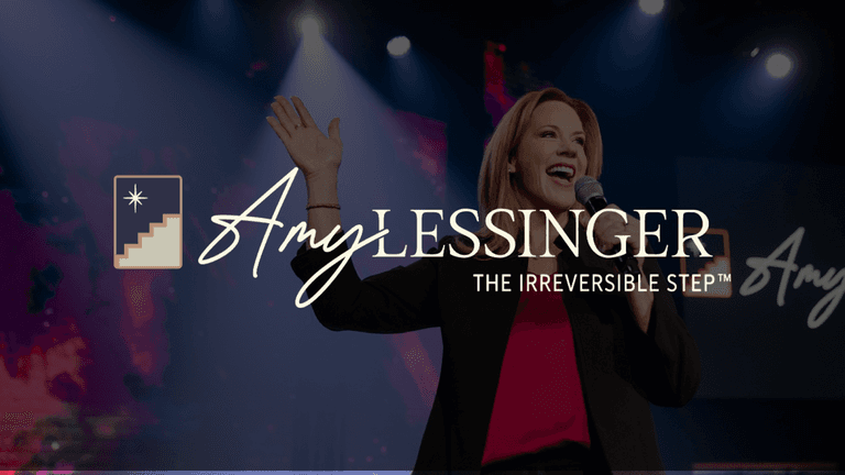Amy Lessinger speaking at an event, representing "The Irreversible Step™" leadership transformation framework, empowering leaders to evolve.