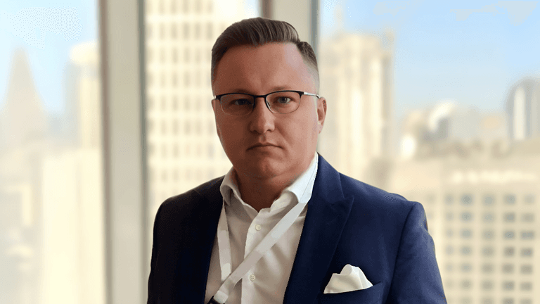 Max Finn, partner at BlackBridge Investment Swiss, advocates for transparency, compliance, and integrity in the evolving digital finance sector.