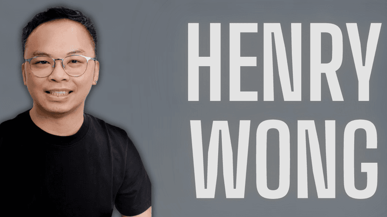 Professional headshot of Henry Wong wearing glasses and a black t-shirt, smiling against a gray background with bold white text displaying his name. Ideal for business branding, marketing, or personal website use