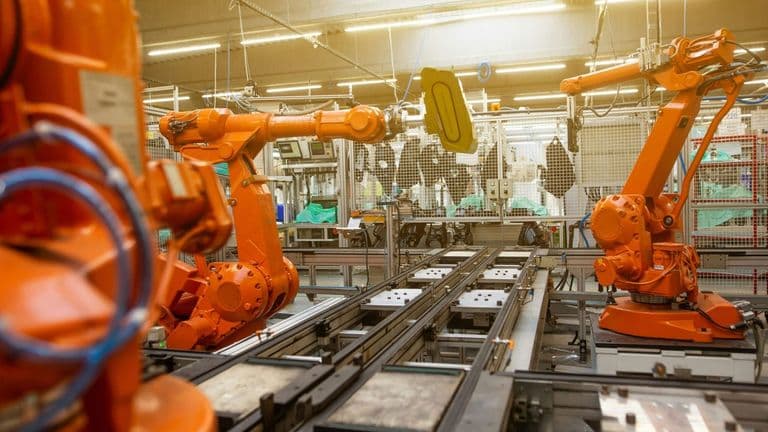 AI Revolution in American Manufacturing: How Robotics Are Transforming Factories in 2025