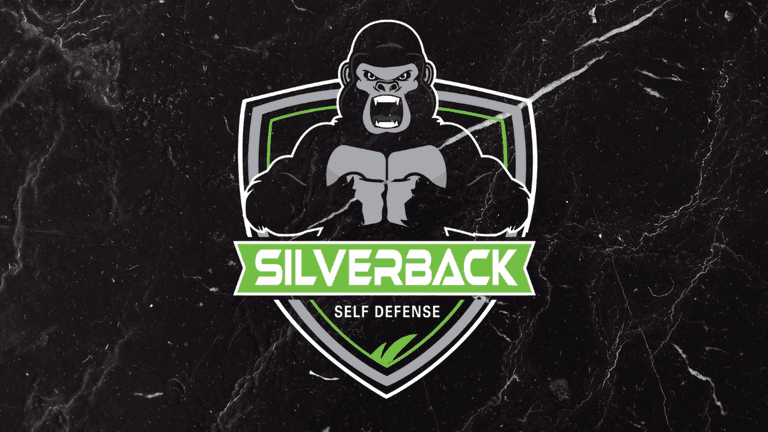 "Silverback Self Defense logo featuring a fierce gorilla, symbolizing strength and protection, representing mobile, customized self-defense training services."