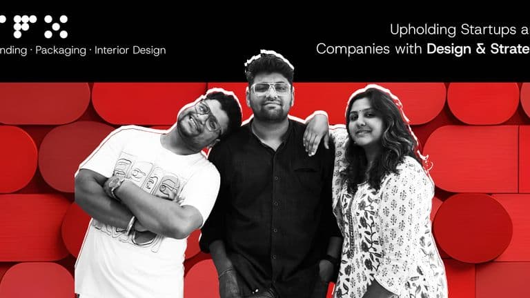Three designers from The Factor X pose confidently against a bold red background promoting branding and strategy.