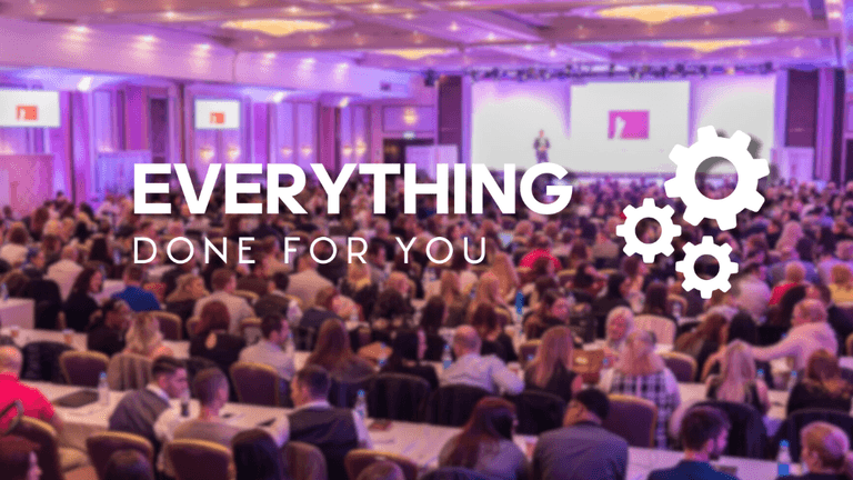 A conference or event with a large audience sitting at tables, with a speaker on stage. The words 'Everything Done For You' and gear icons are overlaid on the image.