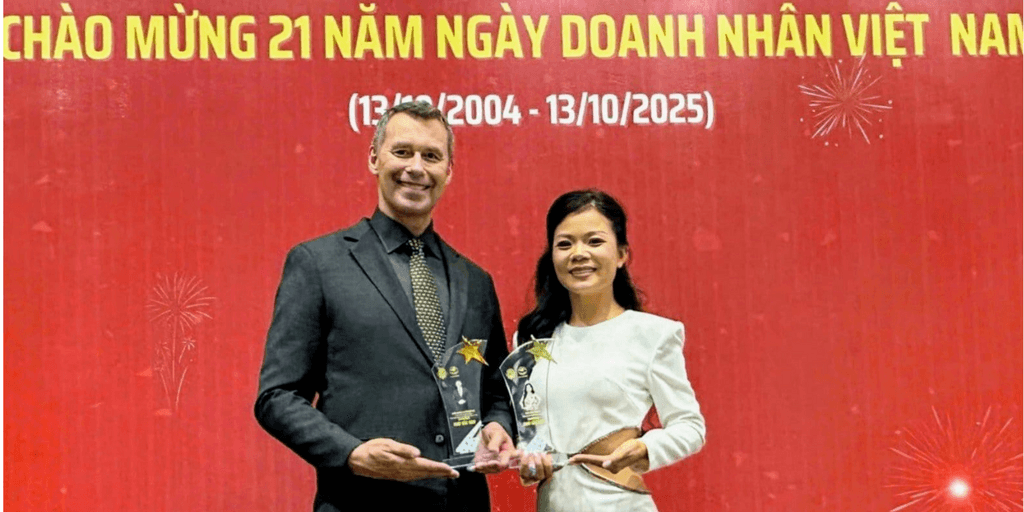 "Dieter Bruhn and Tan Le receiving Outstanding Entrepreneur Awards, recognizing their contributions to leadership development and community impact in Southeast Asia."