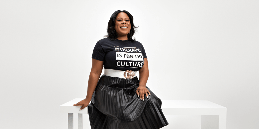 Dr. Adrienne White, founder of Dr. White Therapy Group, confidently promoting therapy for high-achievers and burnout recovery.