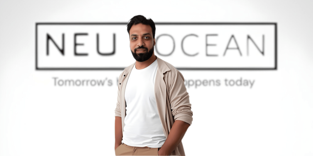 Amir Negm, founder of Neu Ocean Technologies, stands in front of the company logo, representing innovation in digital transformation.