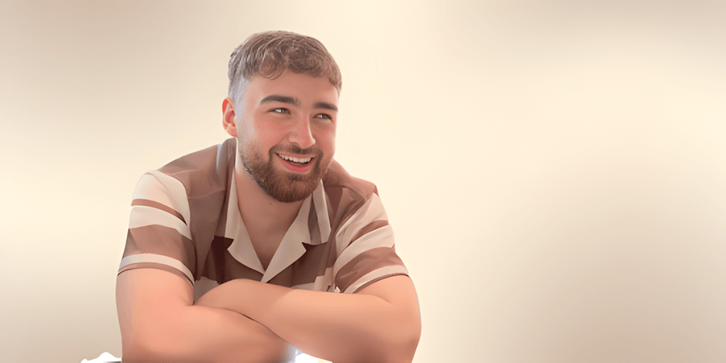 Joseph Stephanides smiling, reflecting on his journey from struggles to building Monopoly Markets.