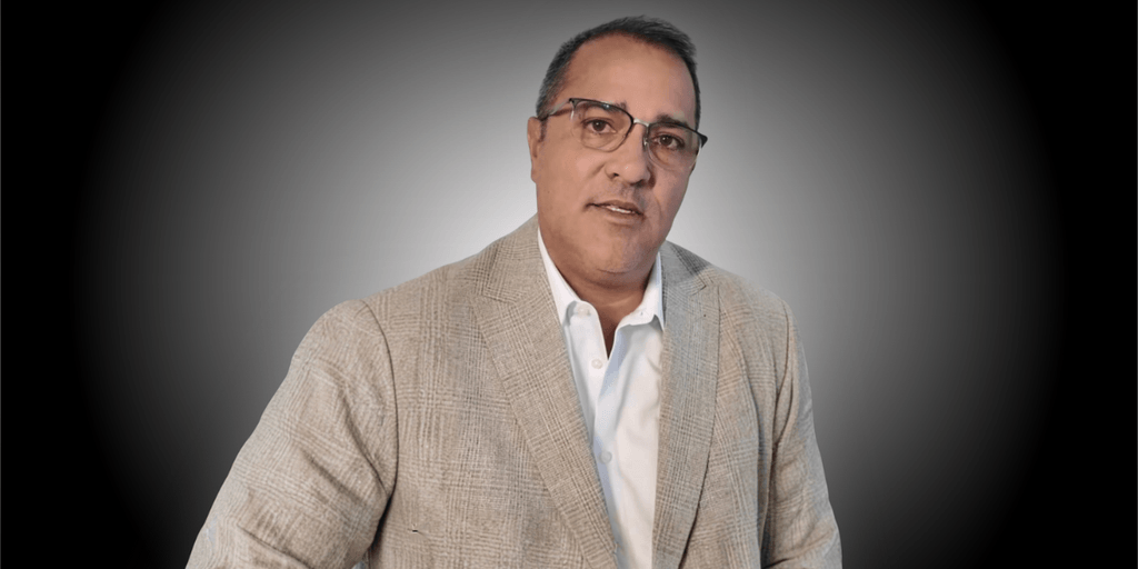 Juan Carlos Hicher, founder of JJ1 Investment Group and HM Development, leading U.S. real estate with a community-focused vision.