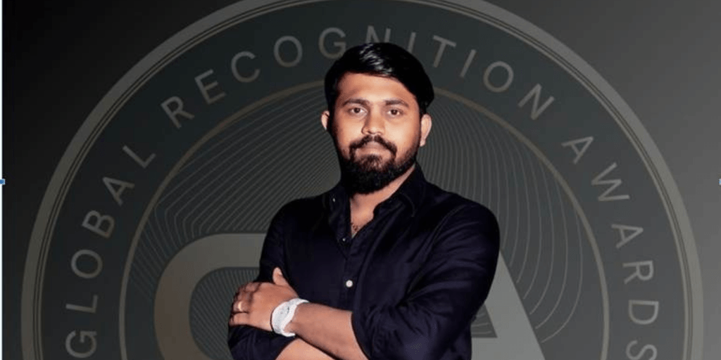 "Vaidik Patel, founder of Sunvista Energy, accepts the 2025 Global Recognition Award for Service Excellence in Renewable Energy."