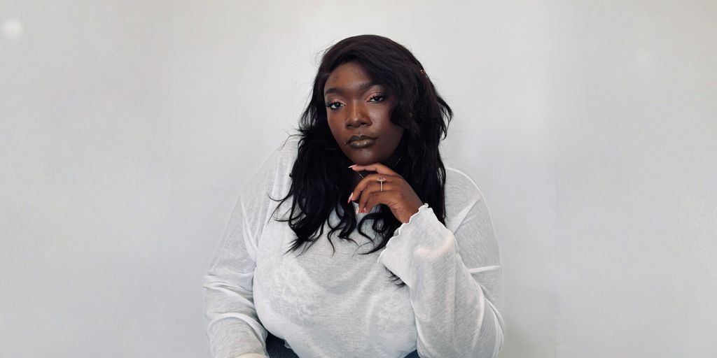 Oluwaremilekun Sokeye, co-founder of Ekoodigita and EkóòPR, poses thoughtfully, blending culture, creativity, and strategy to build global brands.