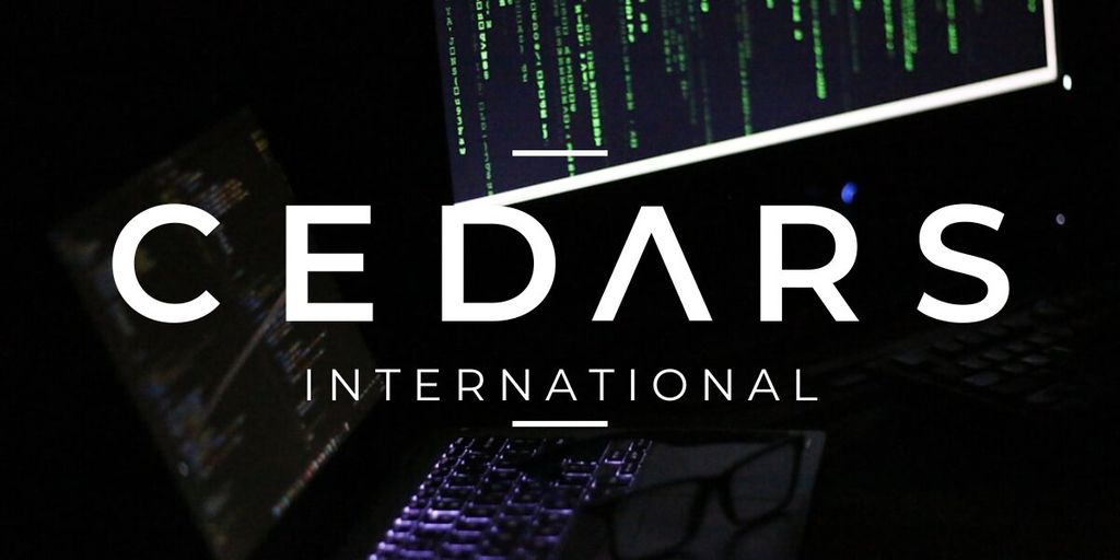 Cedars International logo over dark cybersecurity-themed screens displaying green code and laptop keyboards.