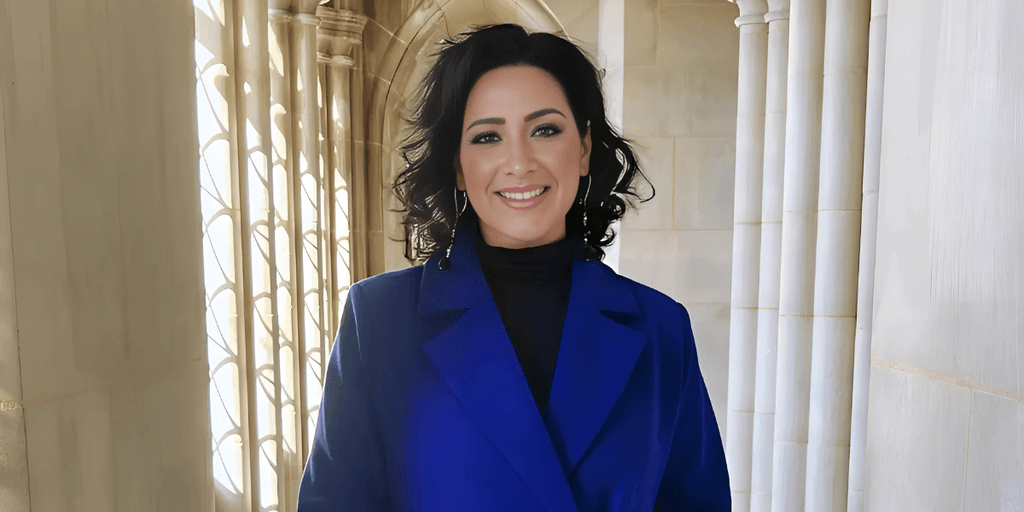 Adriana Rosales, founder of RMPStudio™, stands confidently, embodying her mission to amplify multicultural voices in publishing and cultural architecture.