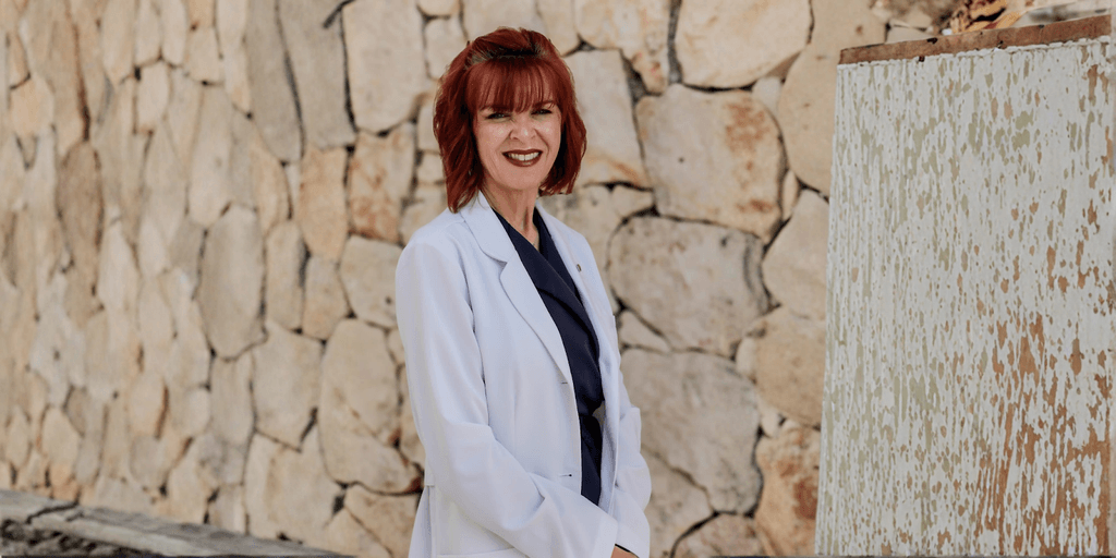 Kelly Fletcher, founder of Cascade Vitality Center, providing personalized functional medicine care focused on root-cause treatment for women's health challenges.