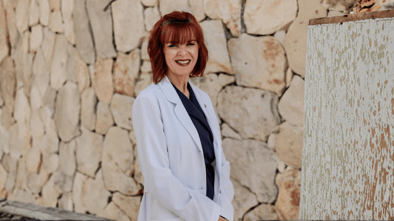 Kelly Fletcher, founder of Cascade Vitality Center, providing personalized functional medicine care focused on root-cause treatment for women's health challenges.