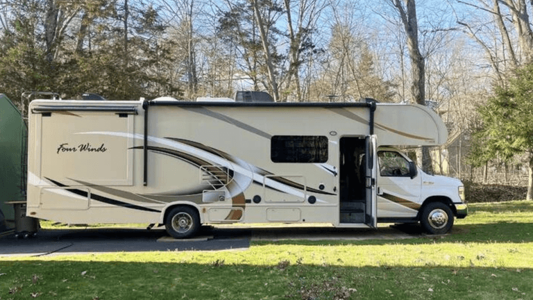 An RV in a scenic natural setting, symbolizing a digital detox and reconnection with nature.