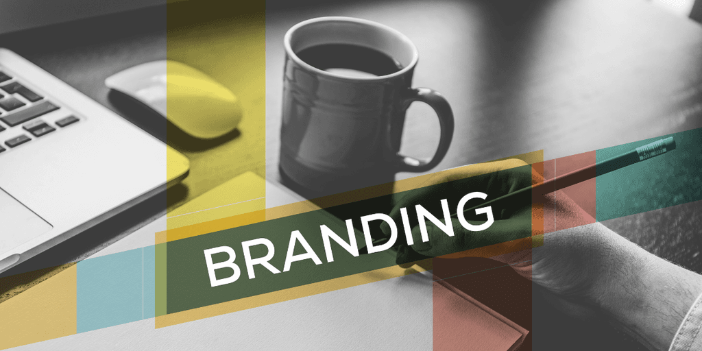 A hand holding a pen beside a coffee cup and laptop, with "BRANDING" overlay