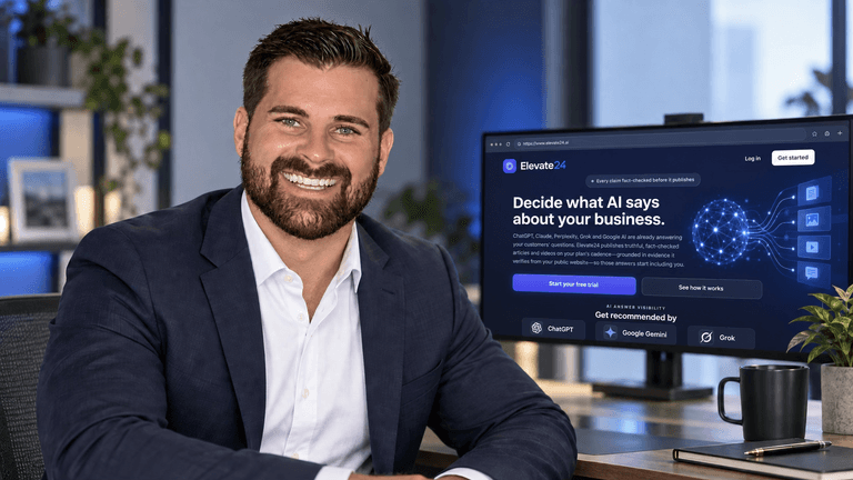 Smiling man in a suit poses in an office with a computer screen displaying AI software