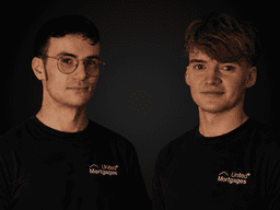 Two young men in black T-shirts with "United Mortgages" logo against a dark background