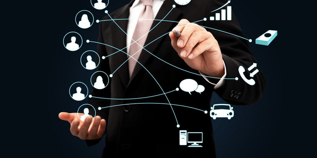 Businessman in a suit interacting with digital connectivity graphics and icons