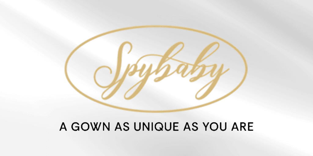 Logo for Spybaby featuring elegant gold script with tagline about unique gowns