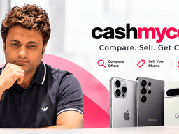 Man sitting thoughtfully beside smartphones, promoting CashMyCell for selling devices.