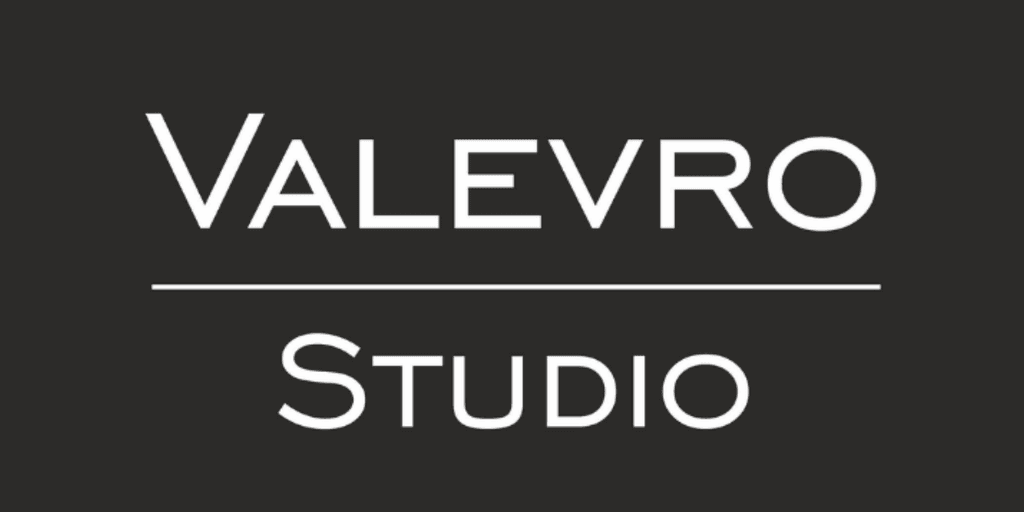 Logo design for Valevro Studio featuring stylish typography on a dark background