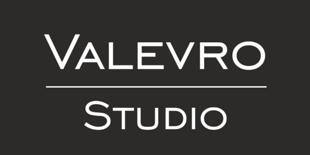 Logo design for Valevro Studio featuring stylish typography on a dark background