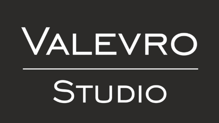 Logo design for Valevro Studio featuring stylish typography on a dark background