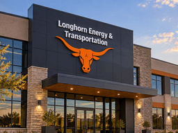 Modern building facade with Longhorn Energy & Transportation signage and decorative landscaping