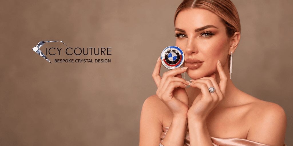 A woman holds a colorful crystal design, showcasing elegant jewelry against a neutral background