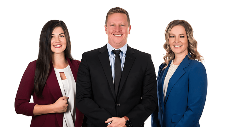 A professional team from Matlock & Associates posing together, embodying their mission-driven approach to federal cybersecurity and IT solutions.