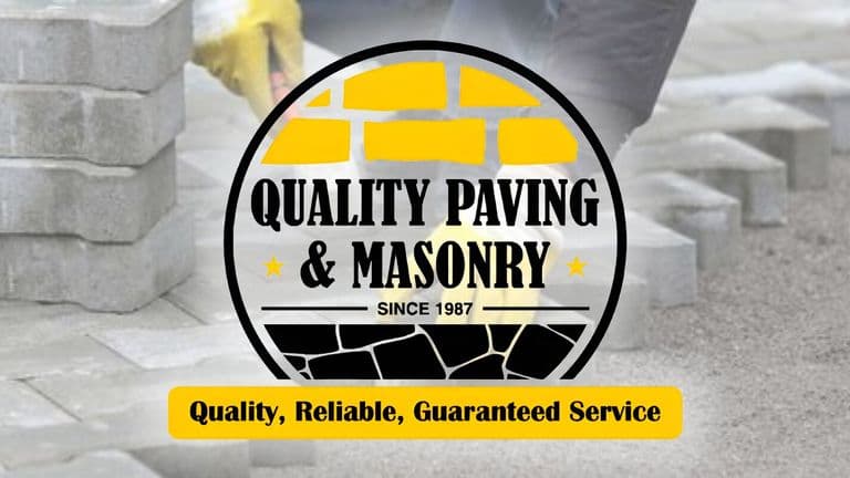 a person laying paving stones with the logo of Quality Paving & Masonry, emphasizing craftsmanship.