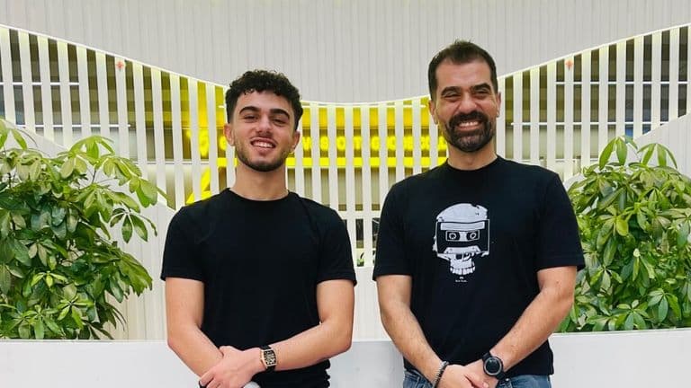 Two men in black shirts stand side by side, representing a modern clothing brand's event-based marketing approach.