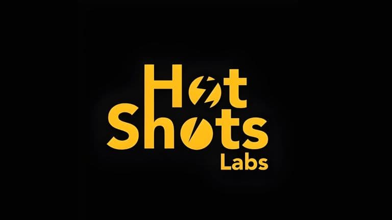 HotShots Labs logo in yellow, featuring a modern, sleek design with bold text and a lightning bolt symbol.